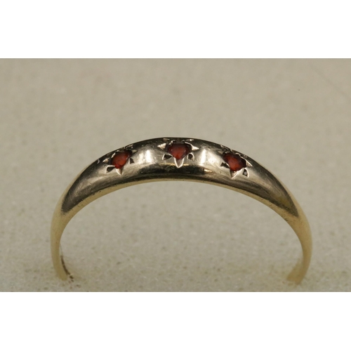 96 - 9CT Gold Ring with 3 Small Garnets Overall Weight 1.4grams