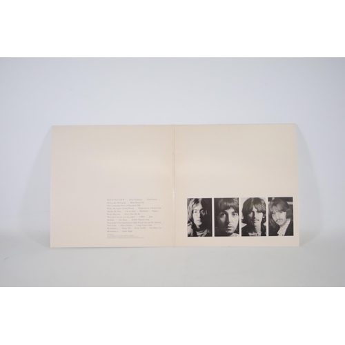 104 - The Beatles, White Album PMC 7067, Vinyl Album, Complete with photos and poster, Sleeve slightly dis... 