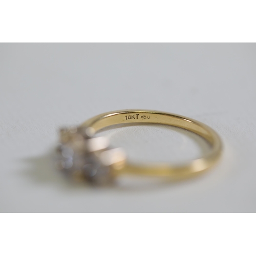 109 - A three stone Princess cut diamond ring, Cathedral set in 18ct yellow gold, ring size S