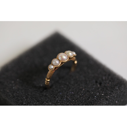 118 - A 5 stone antique pearl ring, set in 18 ct yellow gold, ring size N-O