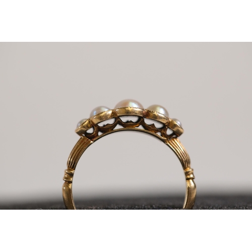 118 - A 5 stone antique pearl ring, set in 18 ct yellow gold, ring size N-O