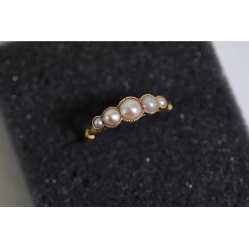 118 - A 5 stone antique pearl ring, set in 18 ct yellow gold, ring size N-O