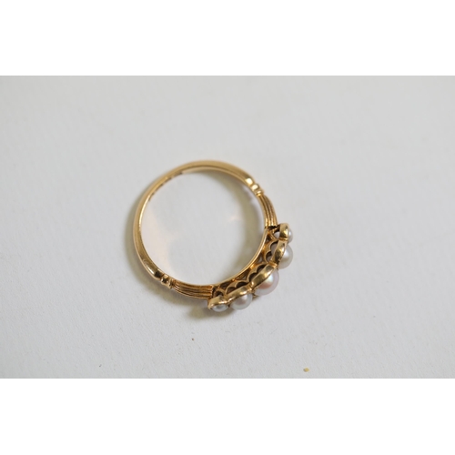 118 - A 5 stone antique pearl ring, set in 18 ct yellow gold, ring size N-O