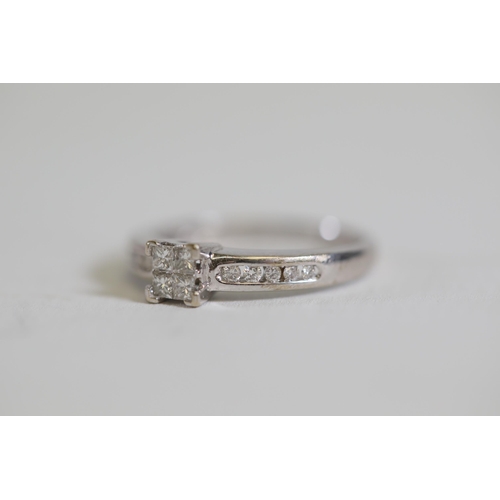 123 - 0.75 diamond solitaire claw set ring with channel set diamond shoulders, in 18ct yellow gold, ring s... 