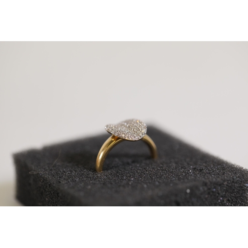 126 - A large oval pave set Diamond ring, in 18ct yellow gold, ring size N