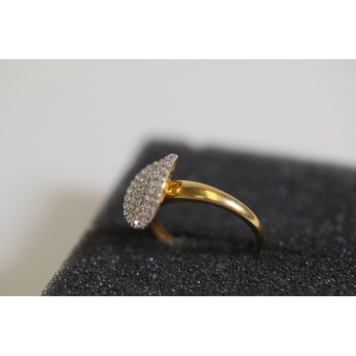 126 - A large oval pave set Diamond ring, in 18ct yellow gold, ring size N