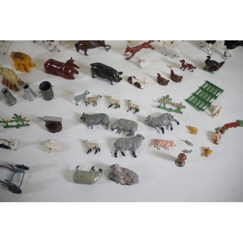 131 - Over 60 items of vintage Britain's lead farm animals, people and scenery