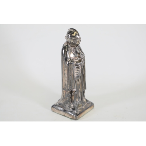 14 - A silvered vintage Spelter Armoured Knight novelty lighter.