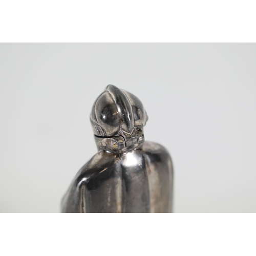 14 - A silvered vintage Spelter Armoured Knight novelty lighter.