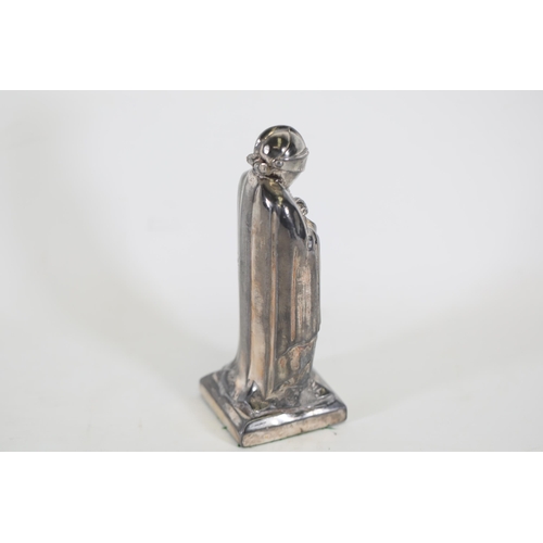 14 - A silvered vintage Spelter Armoured Knight novelty lighter.