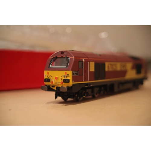 140 - Western Star Hornby Locomotive EWS 67025 boxed and was sealed unsealed for photography then put back... 