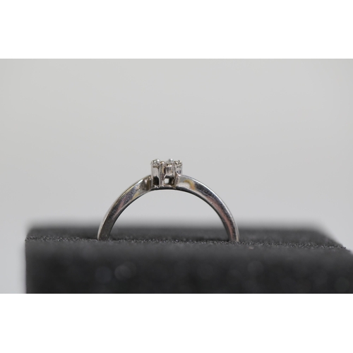 180 - 7 Stone diamond cluster ring set in 9ct white gold ring size between R and S