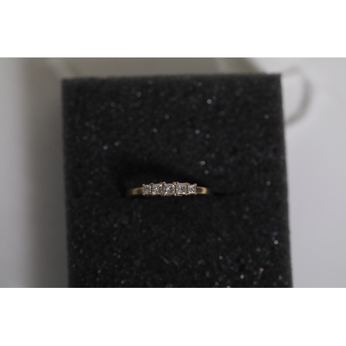 182 - 5 Stone princess cut diamond ring set in 9ct yellow gold ring size is half way between M and N