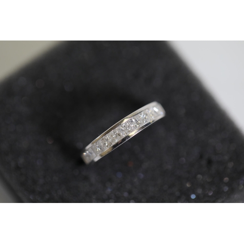 192 - Princess cut diamond half eternity ring set in 18ct white gold ring size M