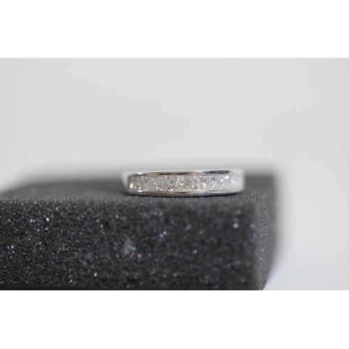 192 - Princess cut diamond half eternity ring set in 18ct white gold ring size M