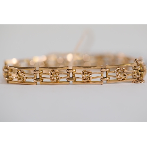 198 - A 15ct gold bracelet weighing 14.48 grams in excellent condition with safety chain.