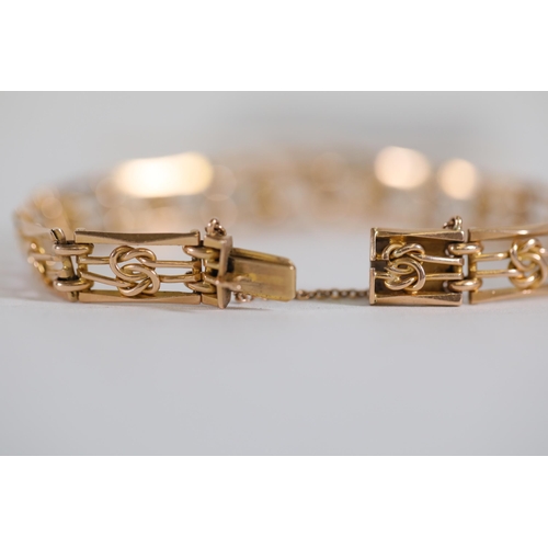 198 - A 15ct gold bracelet weighing 14.48 grams in excellent condition with safety chain.