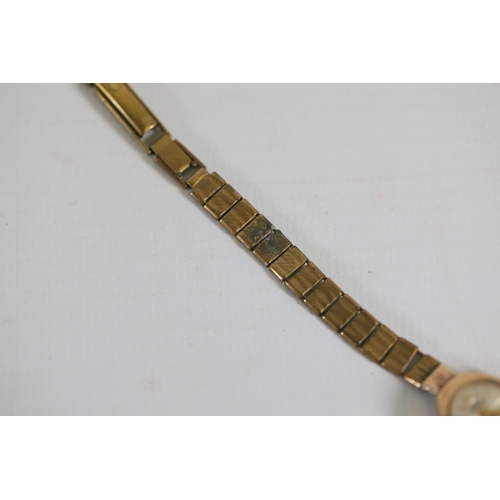 201 - 9ct gold ladies watch (not working) bracelet not gold