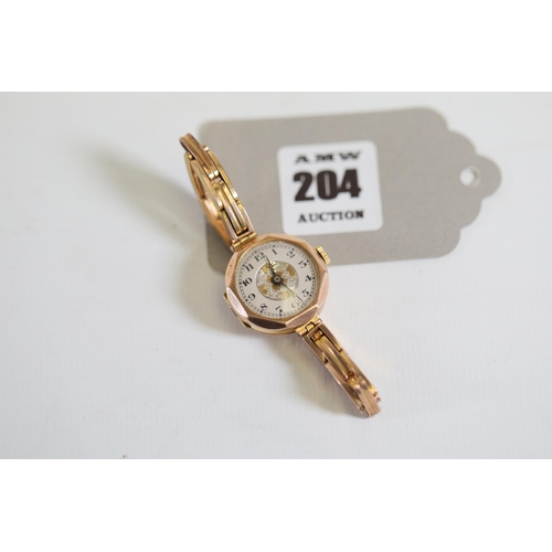 204 - A lovely 9ct ladies watch with Albion ACC9C bracelet, full weight 20.39 grams