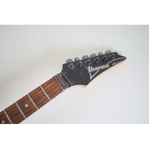 219 - Ibanez RG Series Electric guitar (A/F) requires restringing missing volume and tone control knobs