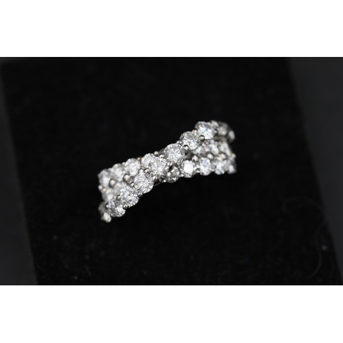 22 - Tested White gold 18ct Diamond cross over ring in 3 rows  25 substantial diamonds Ring size R (this ... 