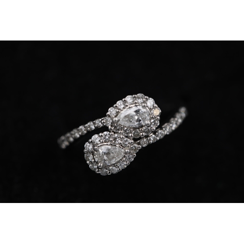 23 - 2 Pear shaped diamonds in diamond clusters 18ct white Gold Ring it also has diamond shoulders and th... 