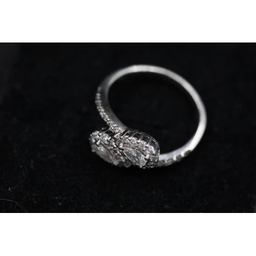 23 - 2 Pear shaped diamonds in diamond clusters 18ct white Gold Ring it also has diamond shoulders and th... 