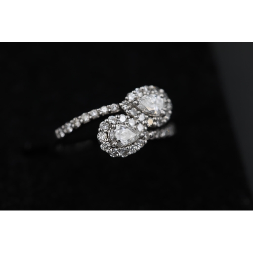 23 - 2 Pear shaped diamonds in diamond clusters 18ct white Gold Ring it also has diamond shoulders and th... 