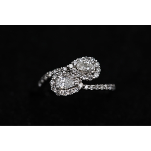 23 - 2 Pear shaped diamonds in diamond clusters 18ct white Gold Ring it also has diamond shoulders and th... 