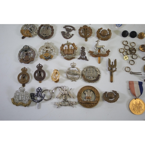 237 - 37 Cap badges from various Countries including Britain, Canada, Germany Poland & France, Various Sho... 