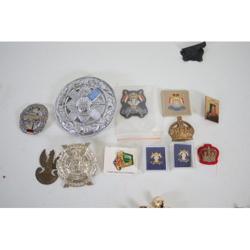 237 - 37 Cap badges from various Countries including Britain, Canada, Germany Poland & France, Various Sho... 