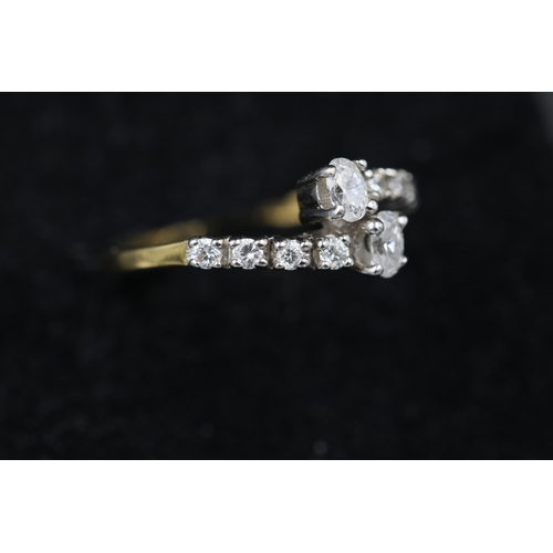 24 - 2 Stone diamond ring with diamond shoulders 18ct yellow gold ring Size is N