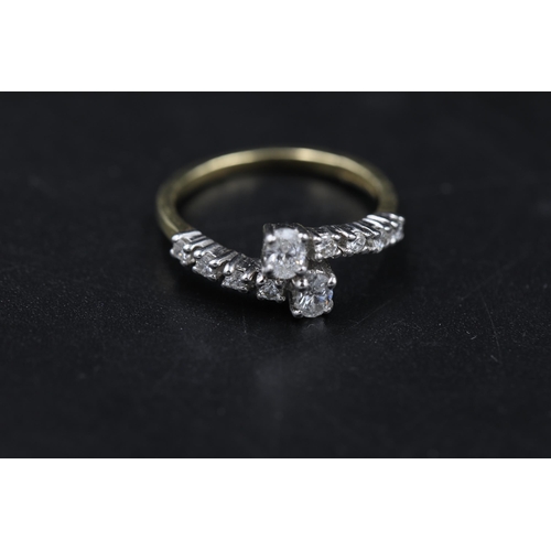 24 - 2 Stone diamond ring with diamond shoulders 18ct yellow gold ring Size is N