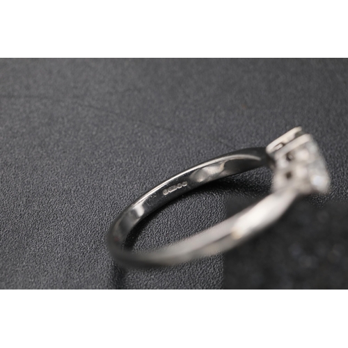 25 - 3 Stone diamond trilogy ring 18ct white gold Size of the ring is R