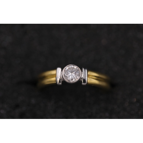 30 - Diamond solitaire in rub over setting 18ct yellow gold Ring 0.5Ct diamond and ring size is P