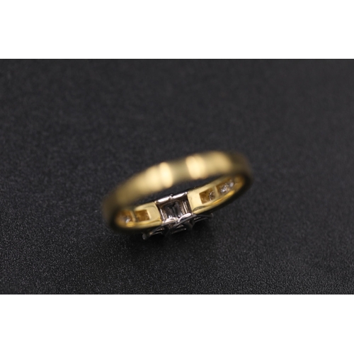 36 - 3 Emerald cut diamonds Cathedral set 18 yellow gold ring it also has diamond shoulders on the ring a... 