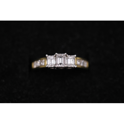 36 - 3 Emerald cut diamonds Cathedral set 18 yellow gold ring it also has diamond shoulders on the ring a... 