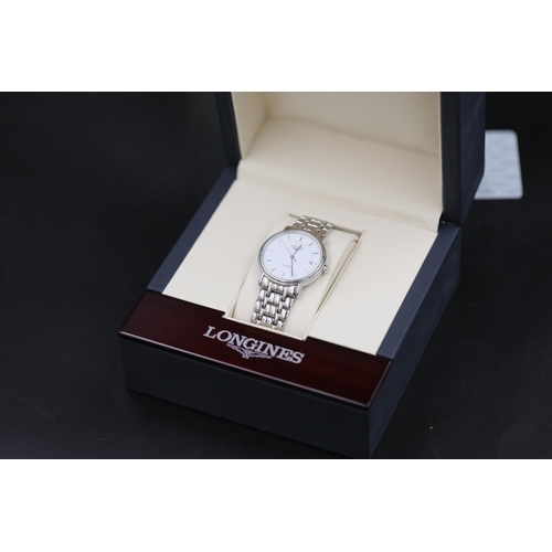 39 - Longines Automatic Stainless Steel Watch in perfect working order, all boxed with all relevant paper... 