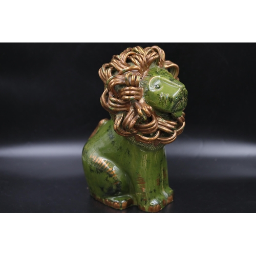 45 - Bitossi Green and Gold Lion Aldo Loindi, Italy, Circa 1968, This impressive piece stands 13 inches t... 