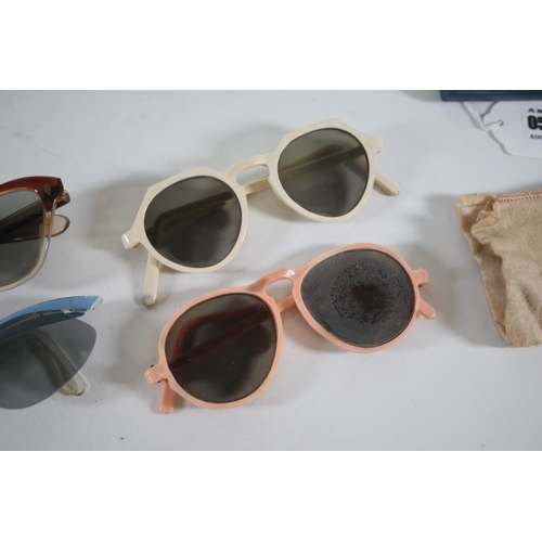 53 - 5 pairs of vintage 50s/60s sunglasses including Polaroid.