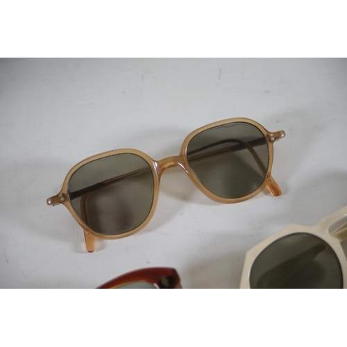 53 - 5 pairs of vintage 50s/60s sunglasses including Polaroid.