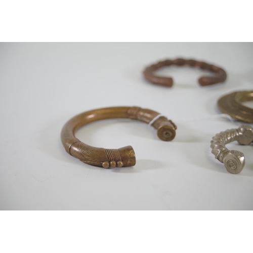 57 - Antique African collection of Bronze and Brass Bracelets, including a ring (possibly low grade silve... 