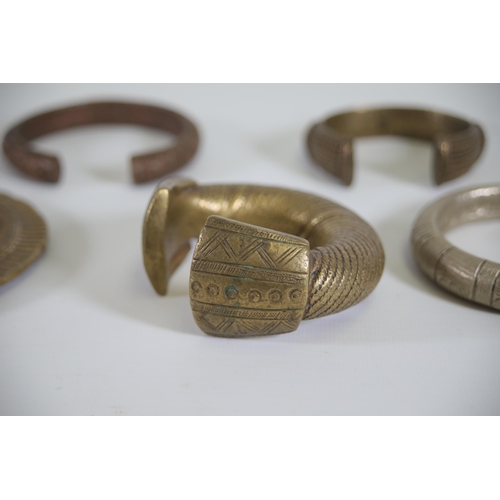 57 - Antique African collection of Bronze and Brass Bracelets, including a ring (possibly low grade silve... 