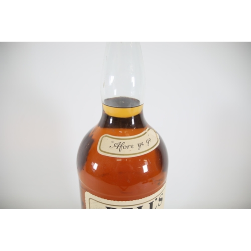 6 - A 4.5 Litre Bottle of Bells Blended Scotch Whiskey. These bottles are becoming quite rare and becomi... 