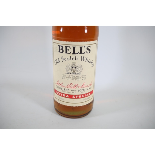 6 - A 4.5 Litre Bottle of Bells Blended Scotch Whiskey. These bottles are becoming quite rare and becomi... 