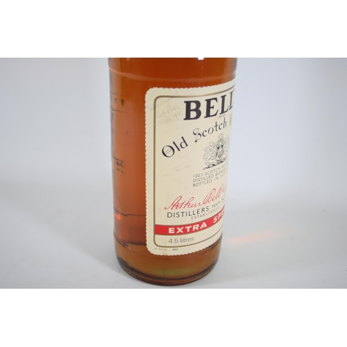 6 - A 4.5 Litre Bottle of Bells Blended Scotch Whiskey. These bottles are becoming quite rare and becomi... 