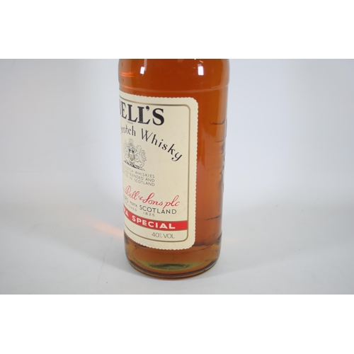 6 - A 4.5 Litre Bottle of Bells Blended Scotch Whiskey. These bottles are becoming quite rare and becomi... 