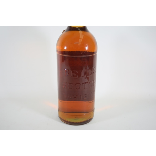 6 - A 4.5 Litre Bottle of Bells Blended Scotch Whiskey. These bottles are becoming quite rare and becomi... 