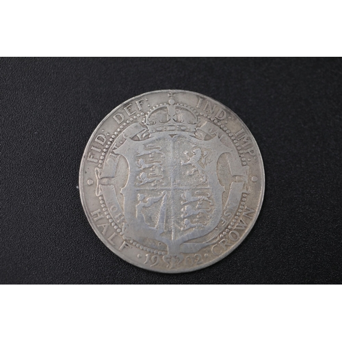 70 - Edward the 8th 1902 silver crown encapsulated Coin is described as worn / rubbed