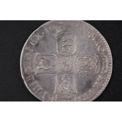 73 - William the 3rd 1697 silver crown a bit bent and worn